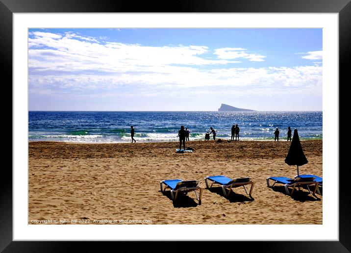 Beach silhouette, Benidorm, Spain. Framed Mounted Print by john hill