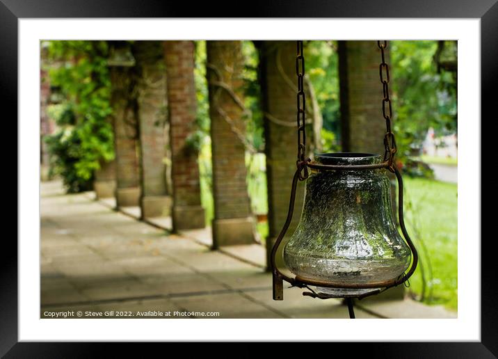 Antique Looking Glass Lantern Hanging from a Rusty Chain.  Framed Mounted Print by Steve Gill