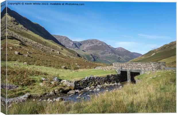 Stream under road bridge at Honister Pass Canvas Print by Kevin White