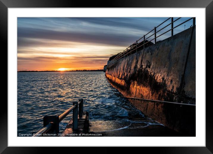 sunset over a body of water Framed Mounted Print by Alan Glicksman