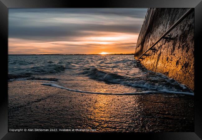 rolling water by the seawall Framed Print by Alan Glicksman