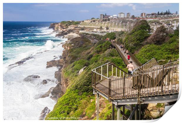 The Bondi to Coogee coastal walk with rough seas and Waverley ce Print by Kevin Hellon