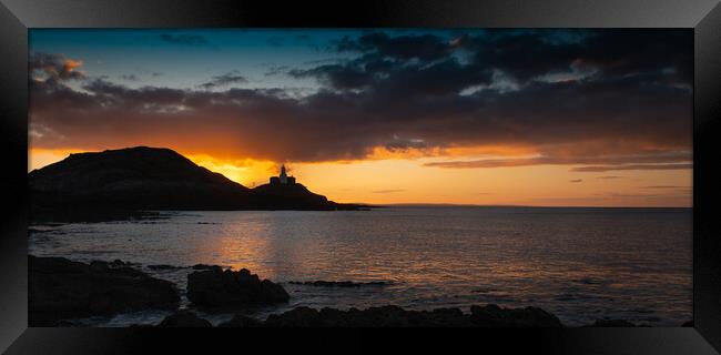 Sunrise at Mumbles lighthouse Framed Print by Bryn Morgan