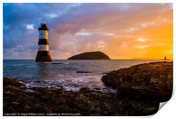 Sunrise at Penmon Lighthouse Print by Nigel Wilkins