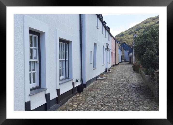 Cottages and cobbles at Boscastle. Framed Mounted Print by David Birchall