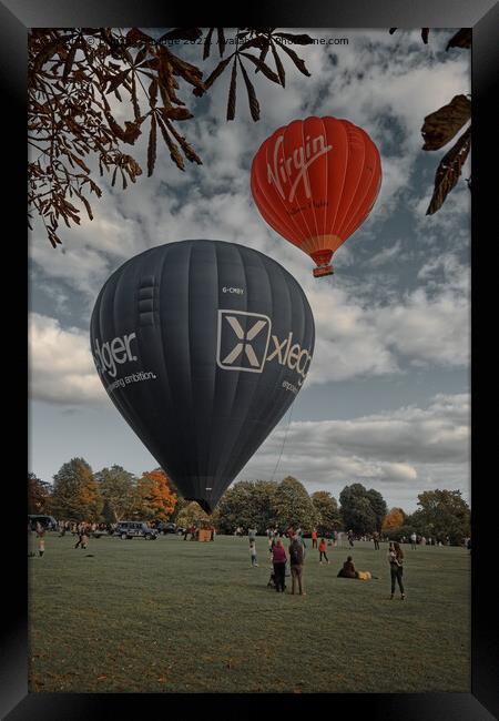 Hot air balloons take of from Bath in the Autumn Framed Print by Duncan Savidge