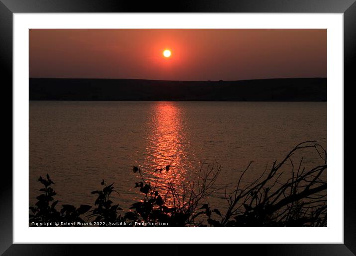 Sun reflection on a lake Framed Mounted Print by Robert Brozek