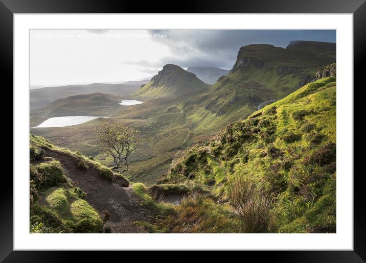 Storm clouds gathering at the Quiraings Framed Mounted Print by Kevin White