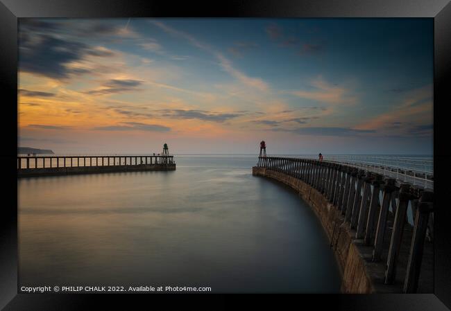 Whitby piers at sunset 785 Framed Print by PHILIP CHALK