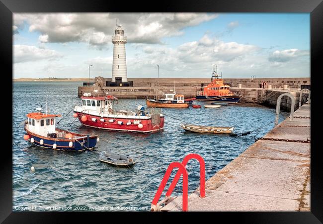 Majestic Donaghadee Lighthouse and Harbour Framed Print by jim Hamilton