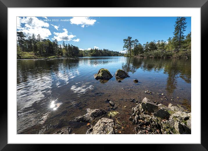 Sun reflection over Tarn Hows Framed Mounted Print by Kevin White