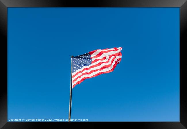 American USA Flag flying on a clear blue sky Framed Print by Samuel Foster