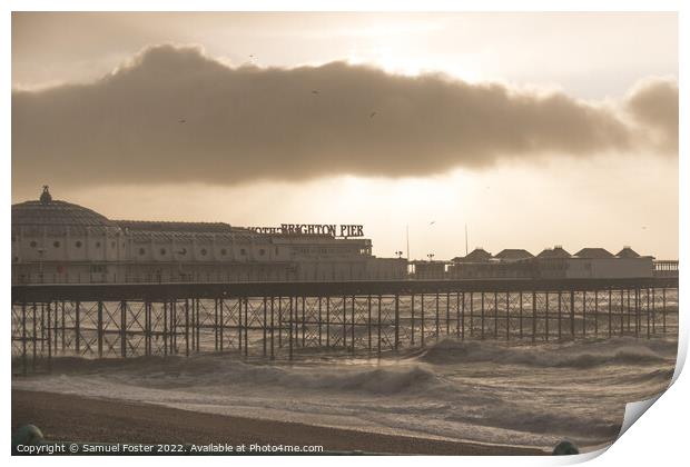 Brighton Pier on a stormy windy day with sun coming through clouds Print by Samuel Foster