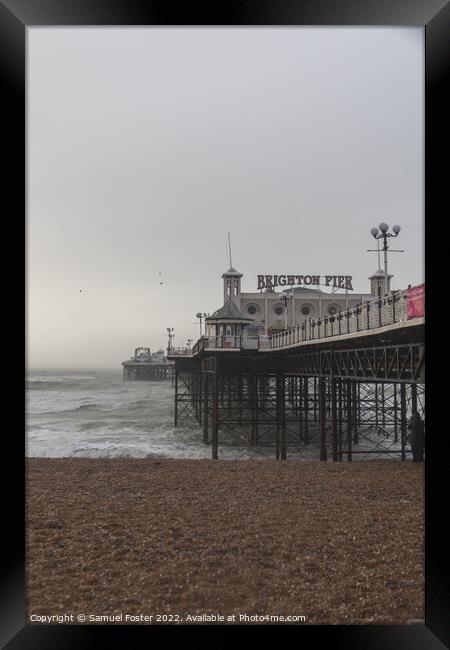 Brighton Pier on a stormy windy day Framed Print by Samuel Foster