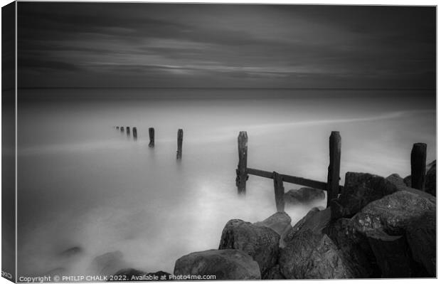 Groynes on Llandulus beach 799 black and white  Canvas Print by PHILIP CHALK