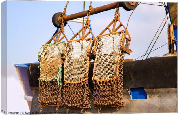 Bow section of fshing boat with nets Canvas Print by Sally Wallis