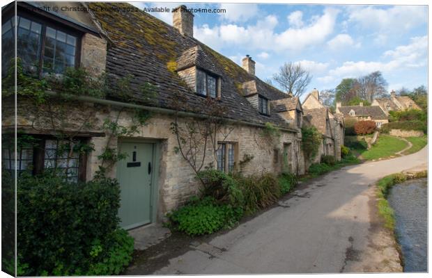 Arlington Row cottages in the Cotswolds Canvas Print by Christopher Keeley