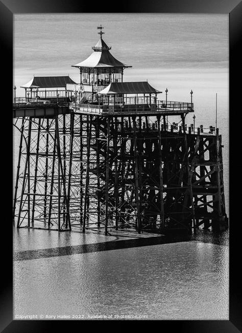 Clevedon Pier at low tide and calm sea Framed Print by Rory Hailes