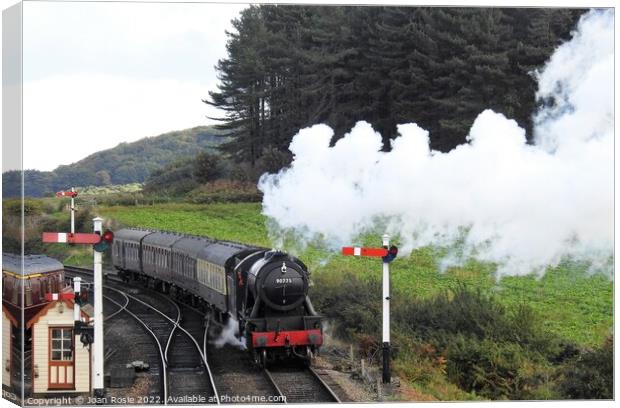 Steam train approaching Weybourne station Canvas Print by Joan Rosie