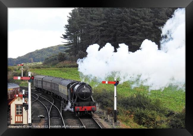Steam train approaching Weybourne station Framed Print by Joan Rosie