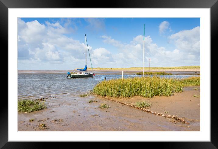 Yacht moored in the River Alt estuary Framed Mounted Print by Jason Wells