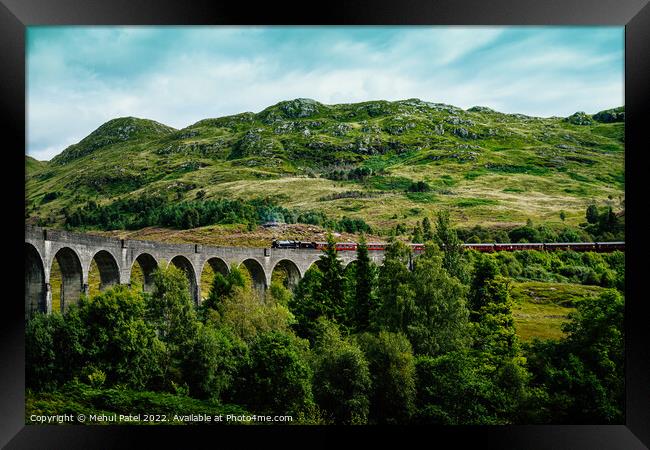 Glenfinnan Viaduct with Jacobite steam train starting to cross Framed Print by Mehul Patel