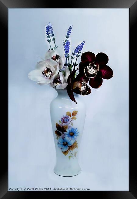  White and purple Cymbidium Orchids in a vase.  Framed Print by Geoff Childs