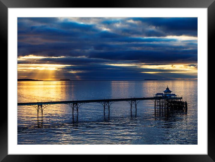 Clevedon Pier on a calm evening at sunset Framed Mounted Print by Rory Hailes