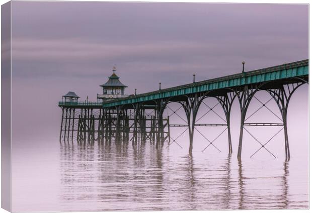 Clevedon Pier on a calm and misty morning Canvas Print by Rory Hailes