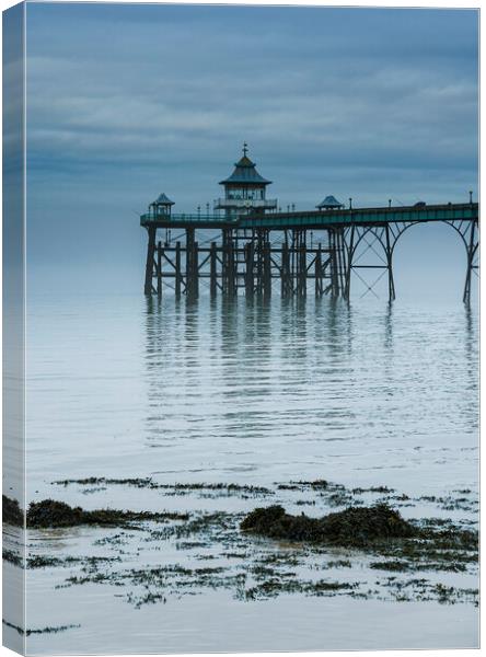 Clevedon Pier on a calm morning with reflection Canvas Print by Rory Hailes