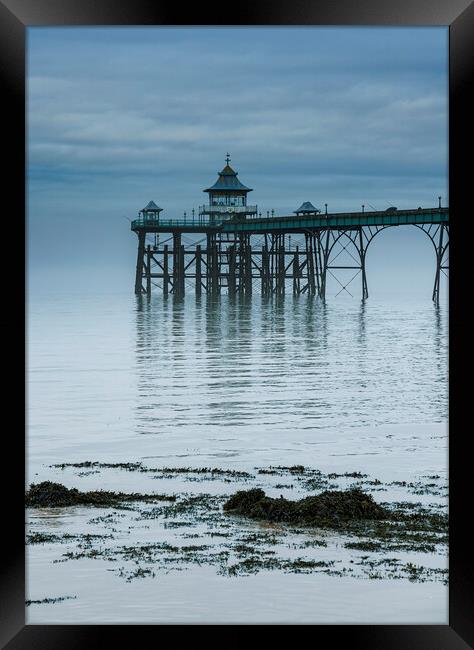 Clevedon Pier on a calm morning with reflection Framed Print by Rory Hailes
