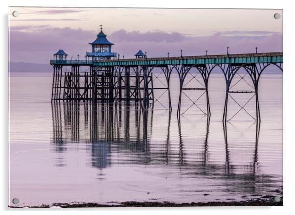 Clevedon Pier with its leg reflecting onto a calm sea Acrylic by Rory Hailes