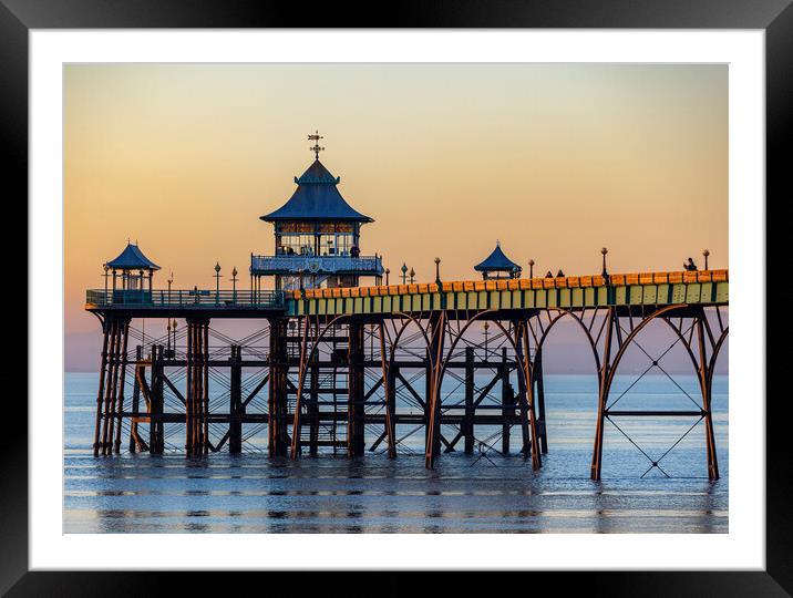 Clevedon Pier at sunset with the side panels catching some sunlight Framed Mounted Print by Rory Hailes