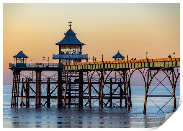 Clevedon Pier at sunset with the side panels catching some sunlight Print by Rory Hailes