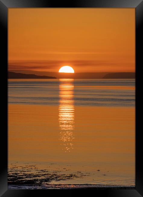 The sun setting over the Exmoor coast. Framed Print by Rory Hailes