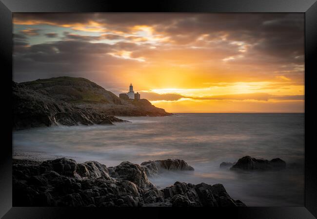 Sunrise at Mumbles lighthouse Framed Print by Bryn Morgan