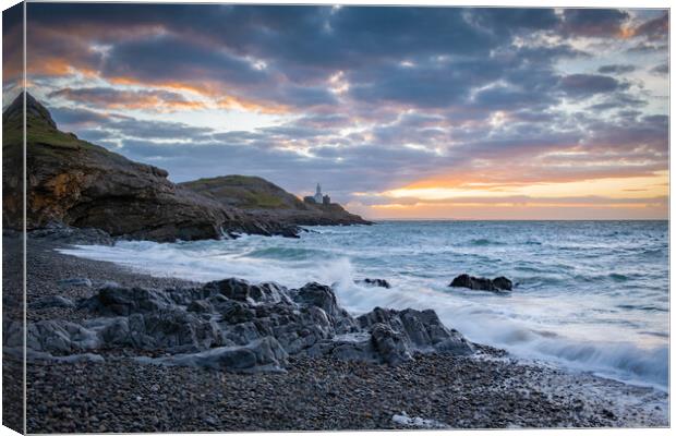 Sunrise at Mumbles lighthouse Canvas Print by Bryn Morgan