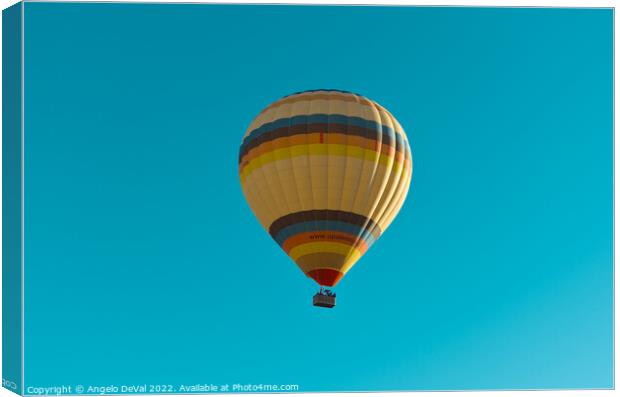 Hot Air Balloon on a Blue Sky in Alentejo Canvas Print by Angelo DeVal