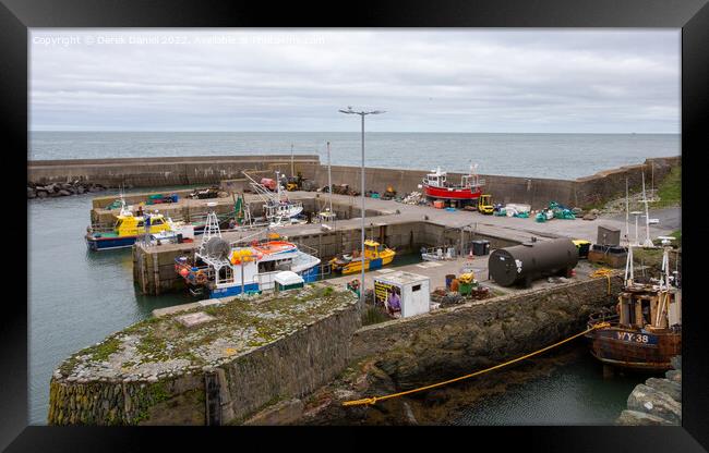 Amlwch Harbour Framed Print by Derek Daniel