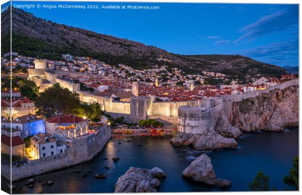 Old walled city of Dubrovnik at dusk, Croatia Canvas Print by Angus McComiskey