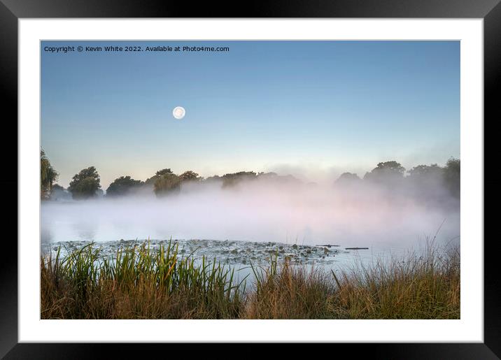 Misty pond with moon in the sky Framed Mounted Print by Kevin White
