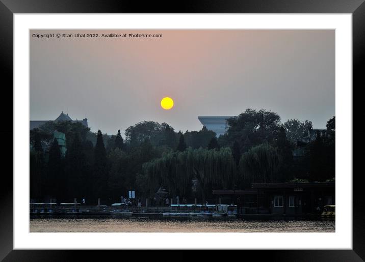 Sun disc over the park in Beijing Framed Mounted Print by Stan Lihai