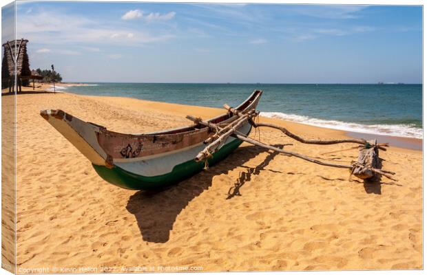 Boat on Mount Lavinia and beach, Colombo, Sri Lanka Canvas Print by Kevin Hellon
