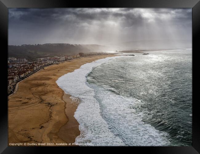 Majestic Nazare Beach Framed Print by Dudley Wood