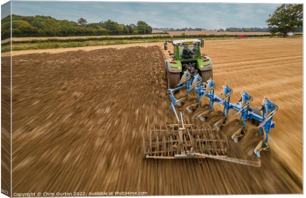 Fendt Tractor Ploughing Canvas Print by Chris Gurton