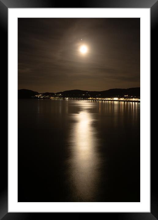 Moon over Llandudno Bay  Framed Mounted Print by christian maltby