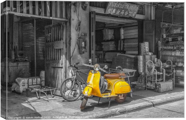 Yellow scooter, Bangkok Canvas Print by Kevin Hellon