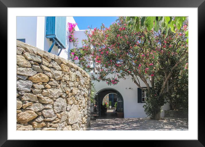 Archway to house, Chora, Mykonos, Greece Framed Mounted Print by Kevin Hellon