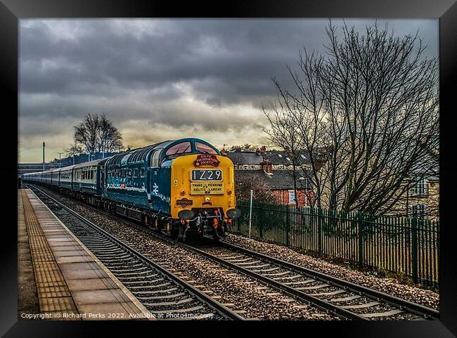 Preserved Deltic locomotive under storm clouds Framed Print by Richard Perks