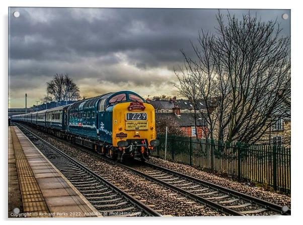 Preserved Deltic locomotive under storm clouds Acrylic by Richard Perks